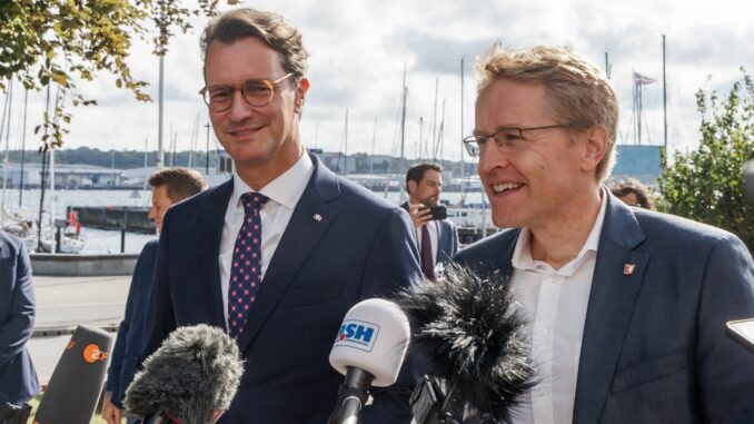 Hendrik Wüst und Daniel Günther stellen sich bei der Kanzlerfrage hinter Friedrich Merz.